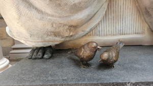 slave woman's feet with two sparrows